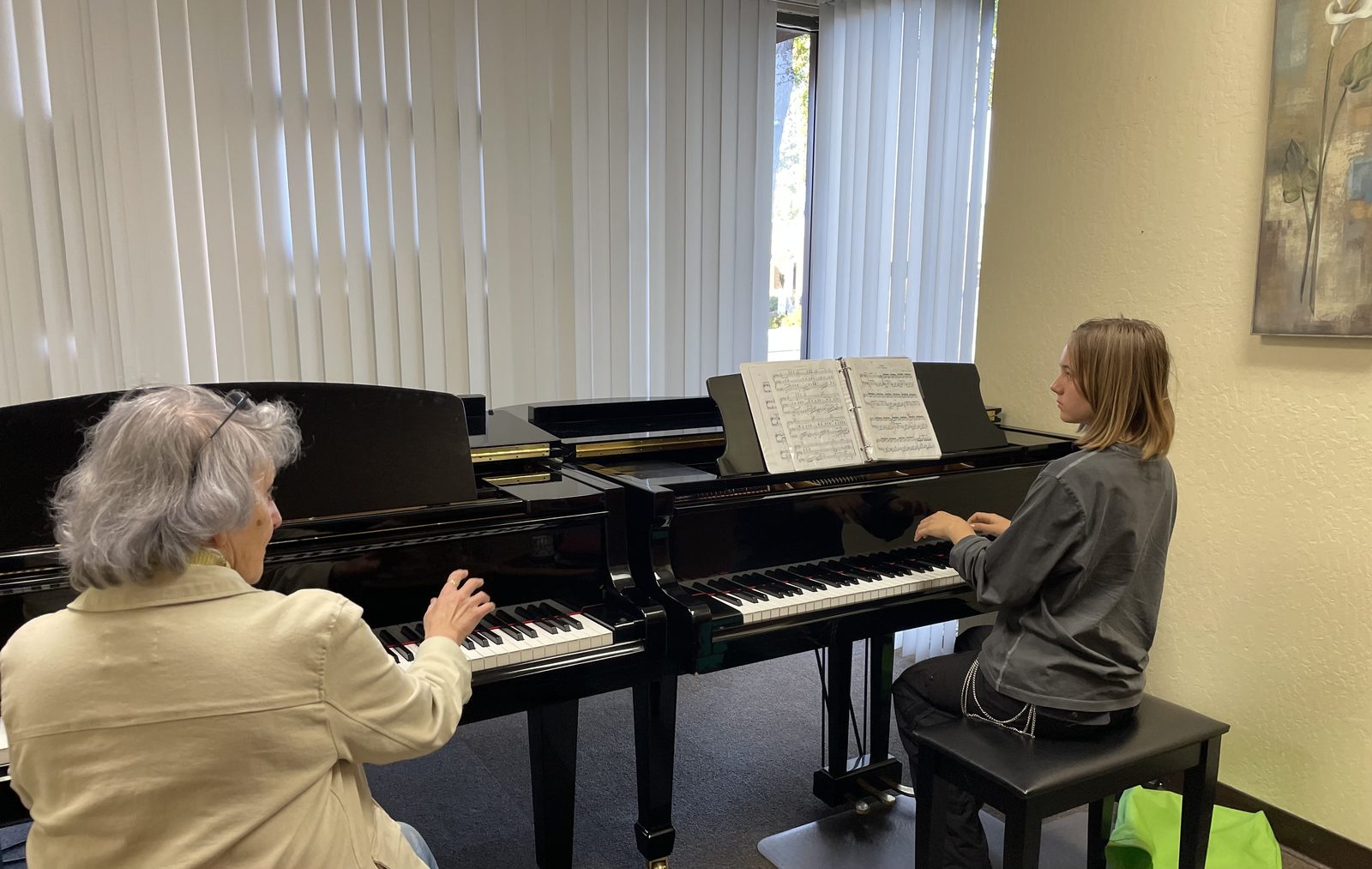 Dina Reznik teaching a student at the piano